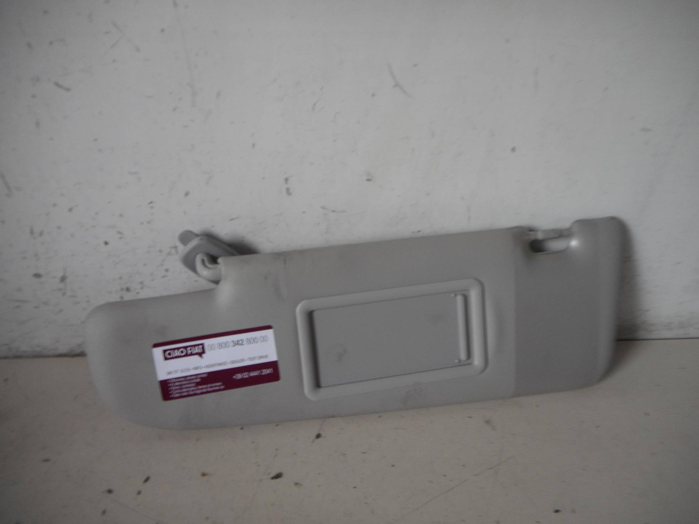 Aletta parasole parabrezza sx.